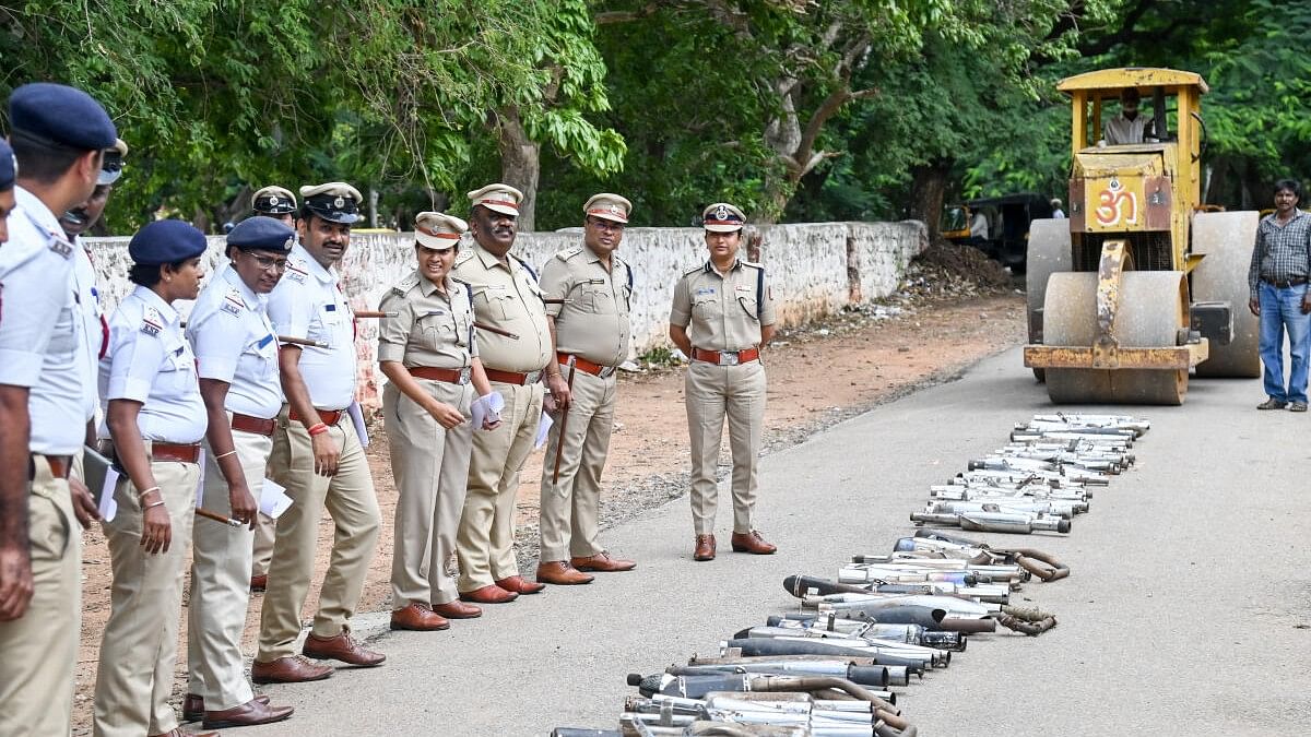 <div class="paragraphs"><p>Mysuru City Traffic Police, led by Commissioner Seema Latkar and DCP (Crime and Traffic) S Jahnavi, DCP M Muththuraj,&nbsp;ACP Traffic H Parashuramappa during a drive launched to destroy defective silencers of seized two wheelers, near Siddartha Nagar Traffic Police Station in Mysuru, on Wednesday.</p></div>